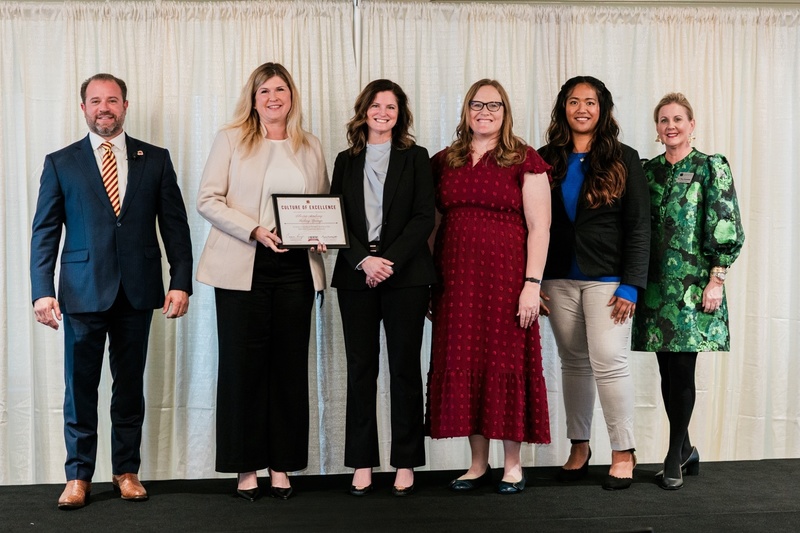 LABSA accepting their award at the Academic Showcase.