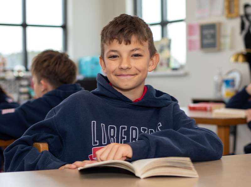 Student reading a book.