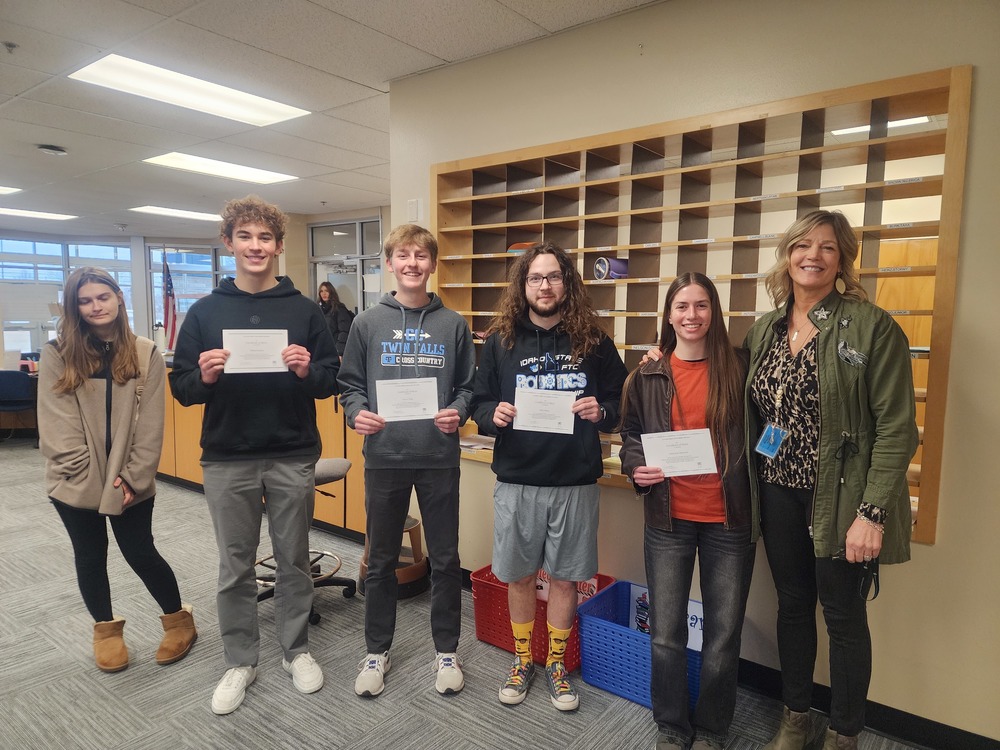 five of sixe national merit finalists receive their awards.