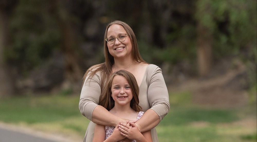 Samantha Mauch poses with her daughter.