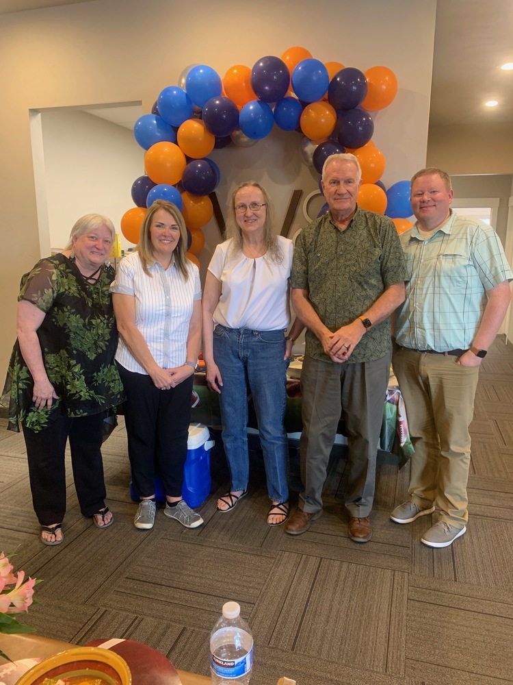 Dennis Brown with co-workers