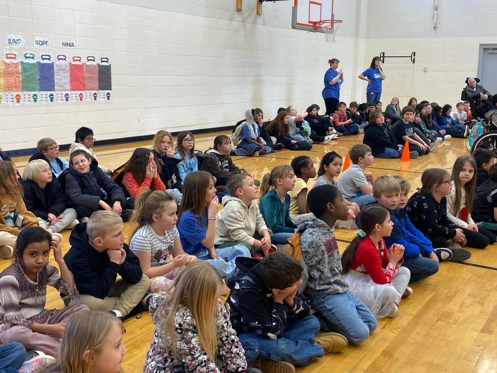 Bickel Kids in the gym learning about the new reading program.
