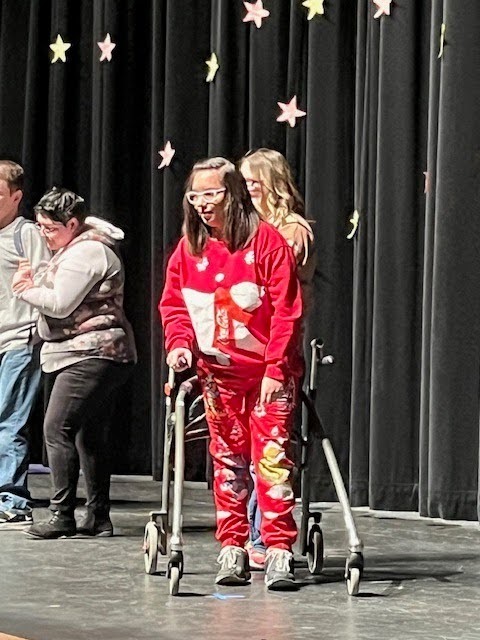 CRHS Anual Fashion show. Students are presentng on sate.