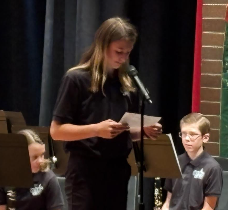 OMS Students Playing in the spring concert and introducing the pieces they are playing.