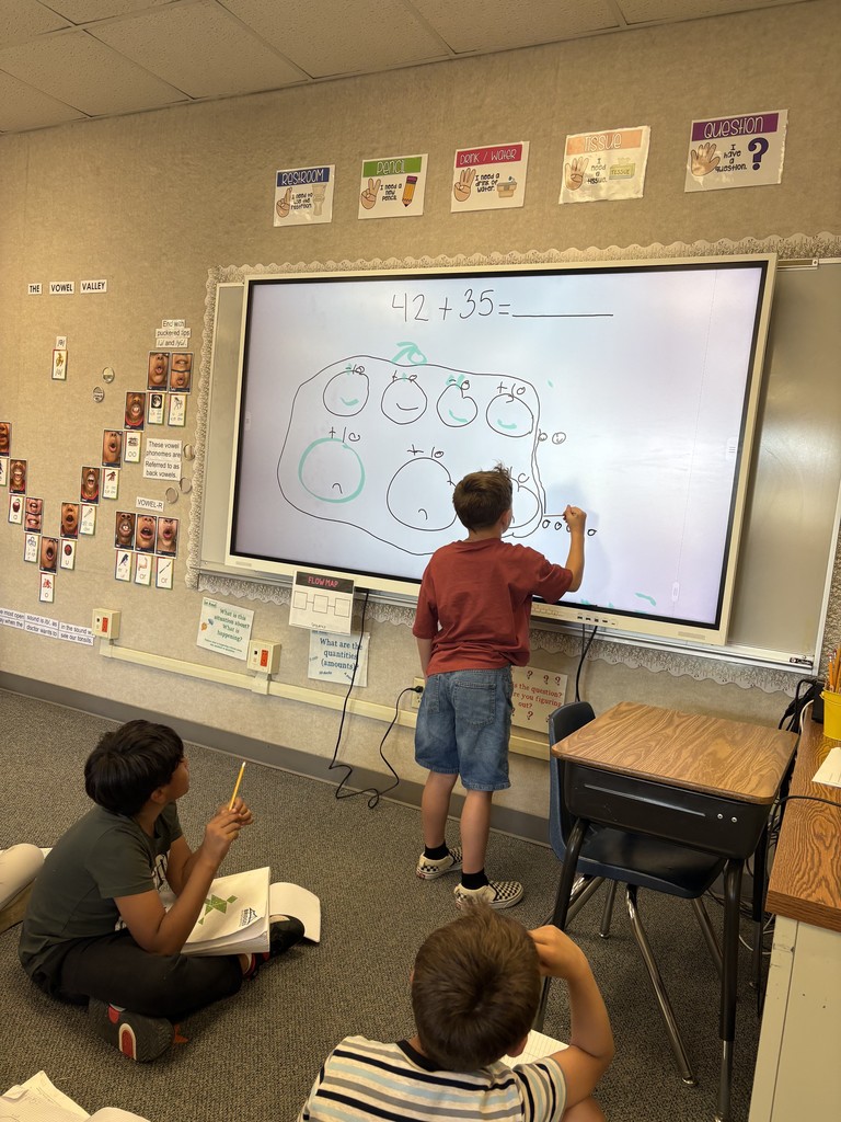 Student working on SMART Board