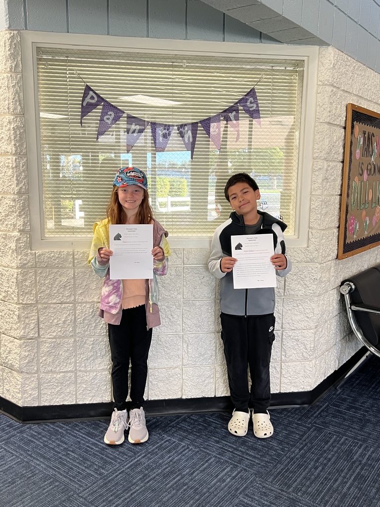 Student with Principal's Pride Award