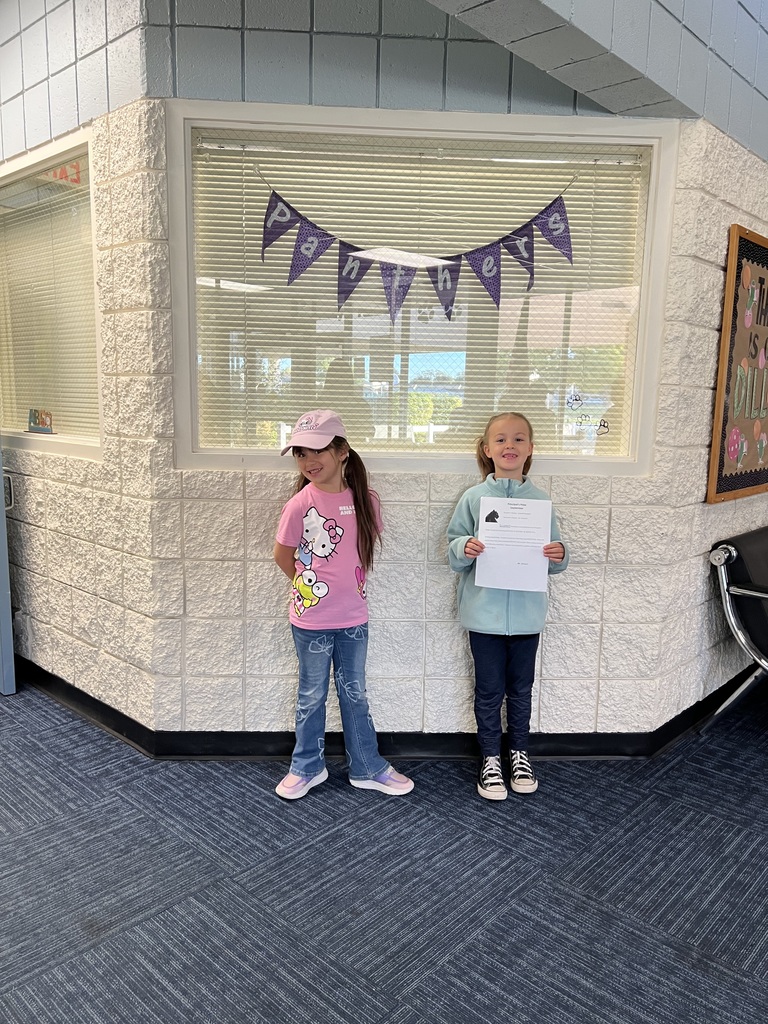 Student with Principal's Pride Award