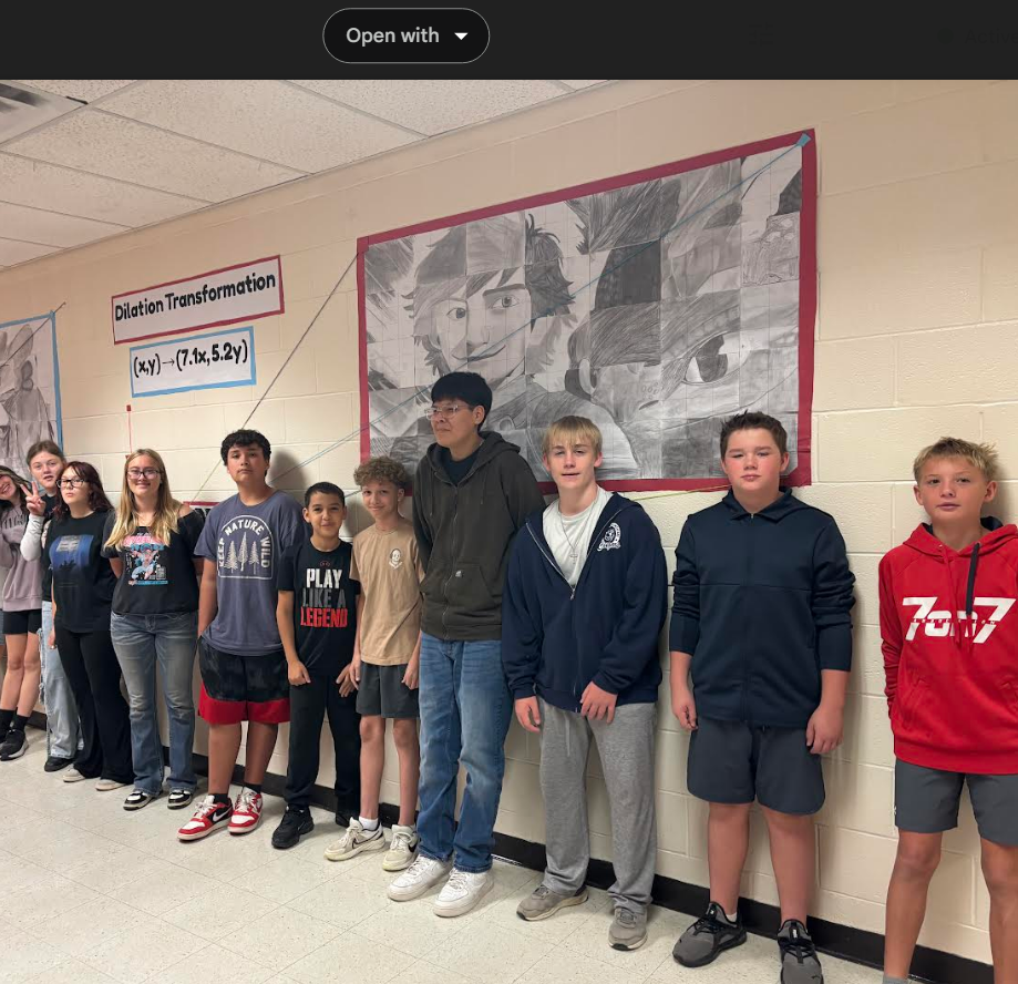 O'leary middle school students showing their work with their transformed pictures from How to Train Your Dragon using dialtaions and applying the scare rule to enlarge each shape.