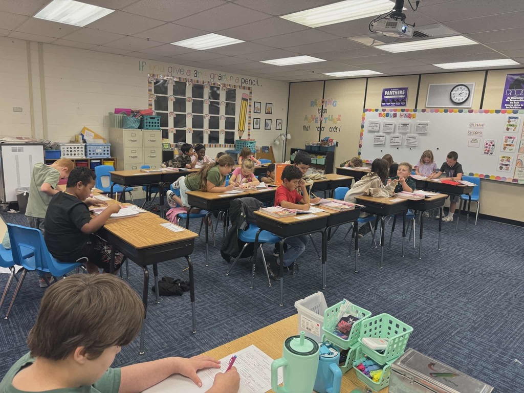 Students work on paragraph shrinking.
