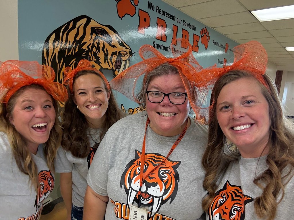 Sawtooth Elementary School staff all dressed up to celebrate Sawtooth Elementary School Turning 50.