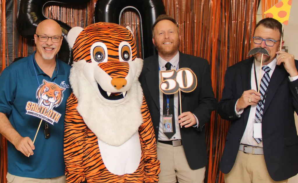 Dr. Dickenson, Dr Nesmith and Jayson celebrating Sawtooth Elementary School's 50th Birthday!