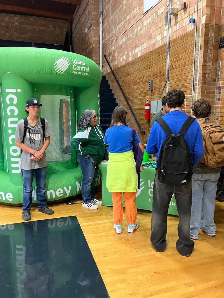 Idaho central booth as a sponsor for the No One Eats Alone picnic at Twin Falls High School.