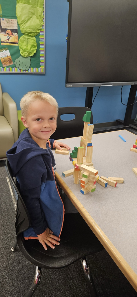 student creating with stem toys