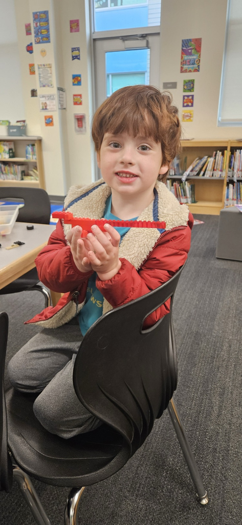 Student creating with stem toys