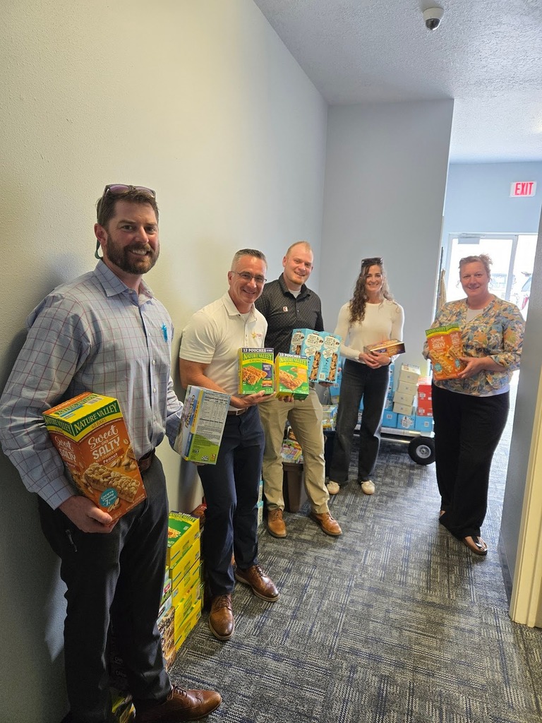 Western Magic Valley Association of Realtors Community Outreach Commitee donating items to the Community Center..