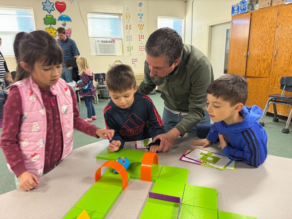 Students and parents at Harrison Elementary working together at STEM night.