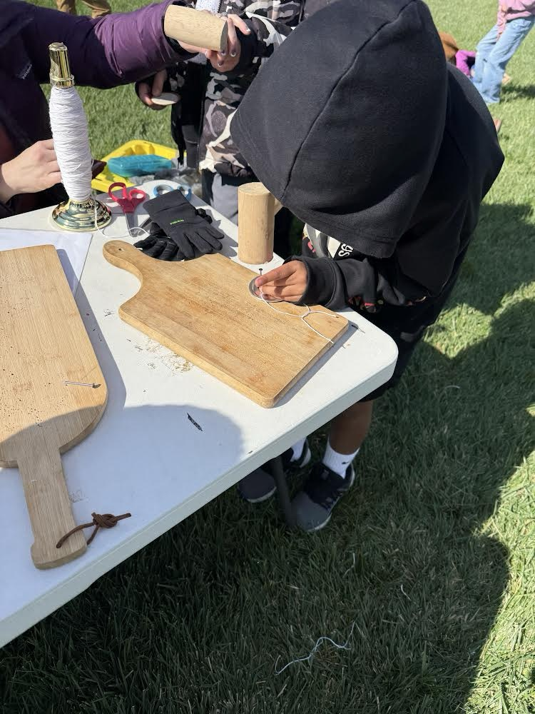 Students learning about pioneers