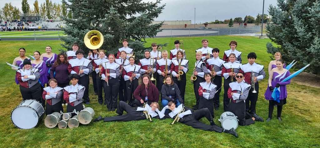 CRHS band and color guard pose for a picture.