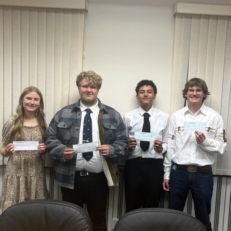 4 students holding awards