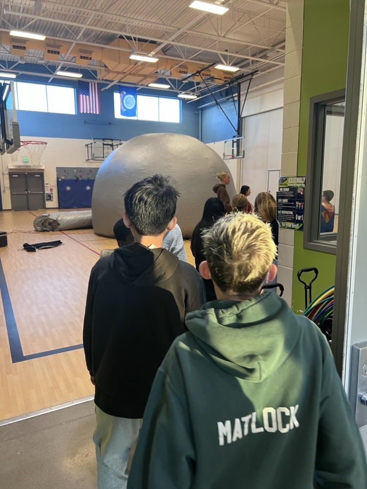 students participating in astronomy lesson