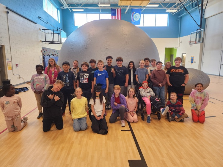 students participating in astronomy lesson