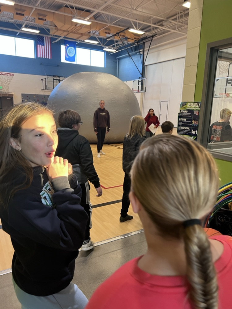 students participating in astronomy lesson