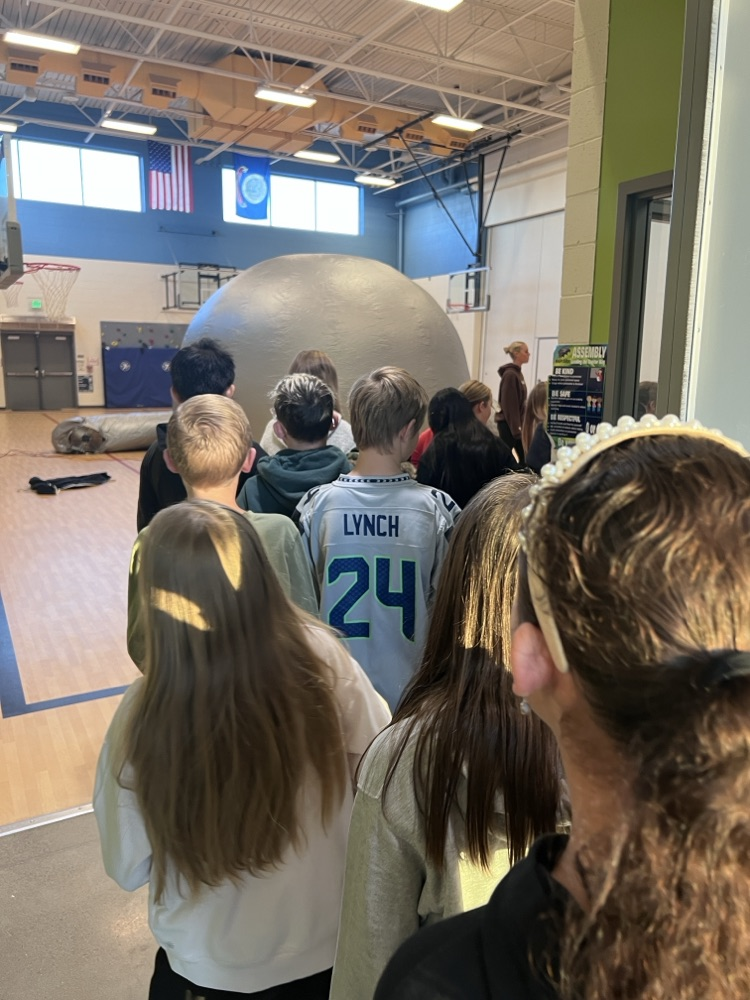 students participating in astronomy lesson