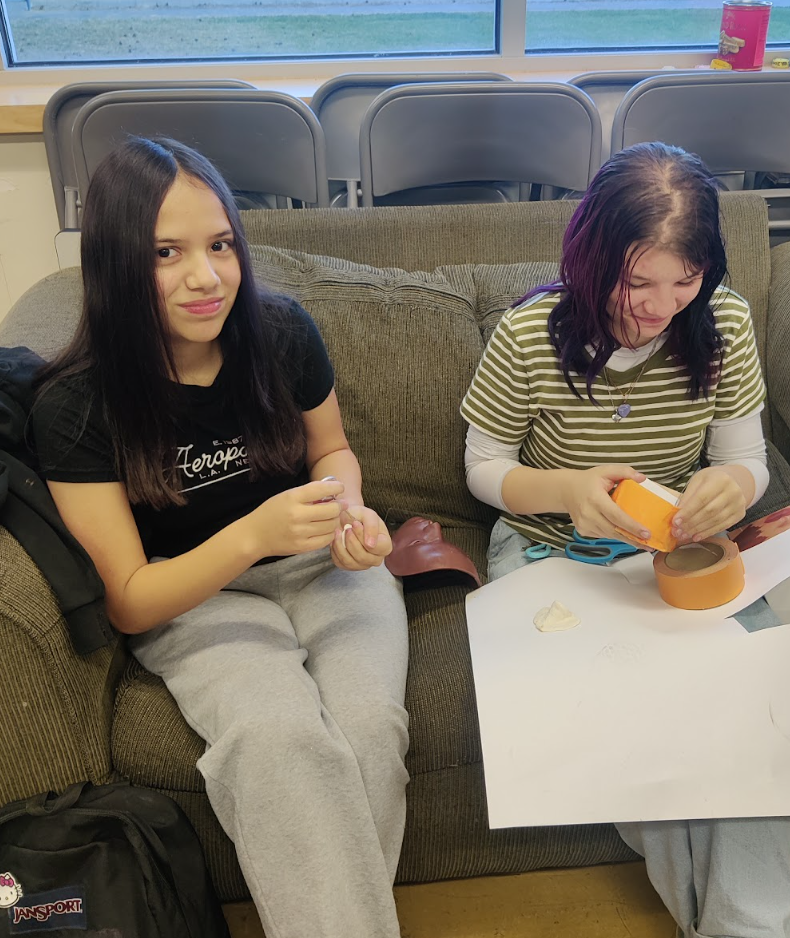 Students working with prosthetics.