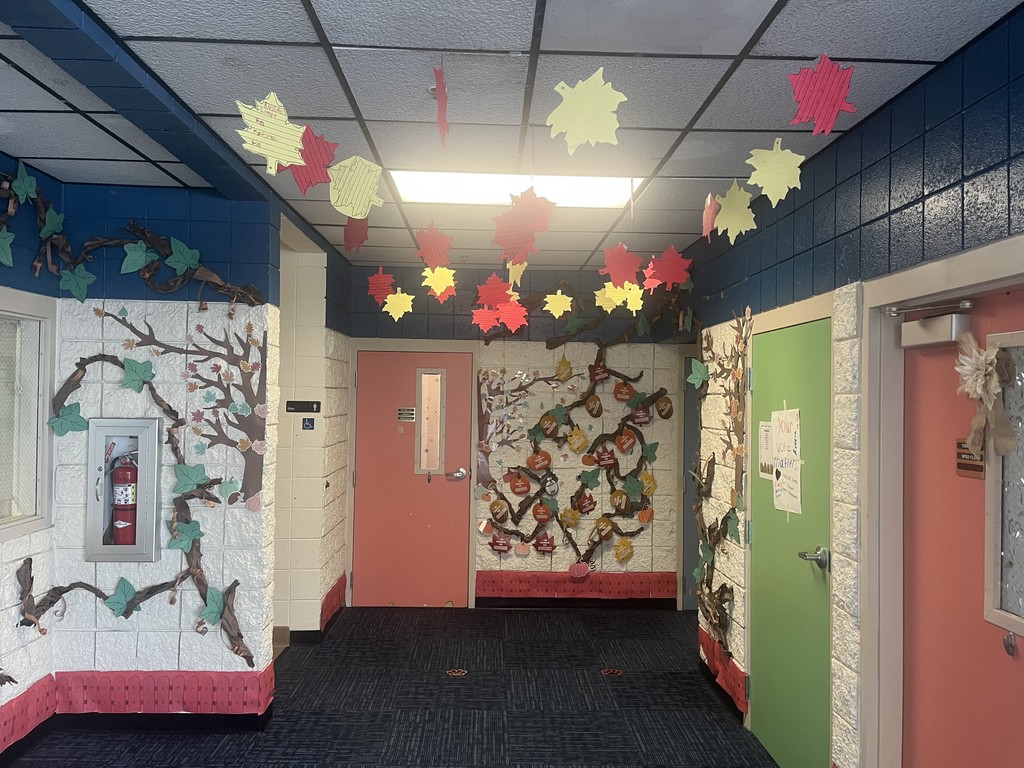 Some students wrote poems on leaves to hang in the hallway.