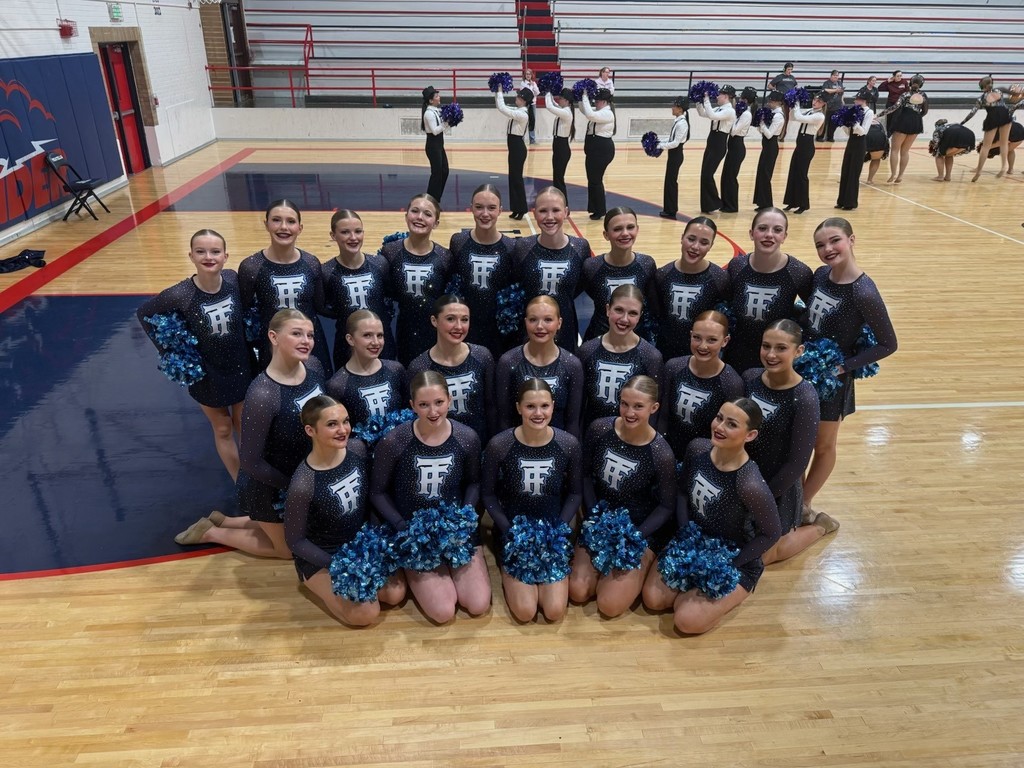 TFHS Bruinettes dance team posed with poms