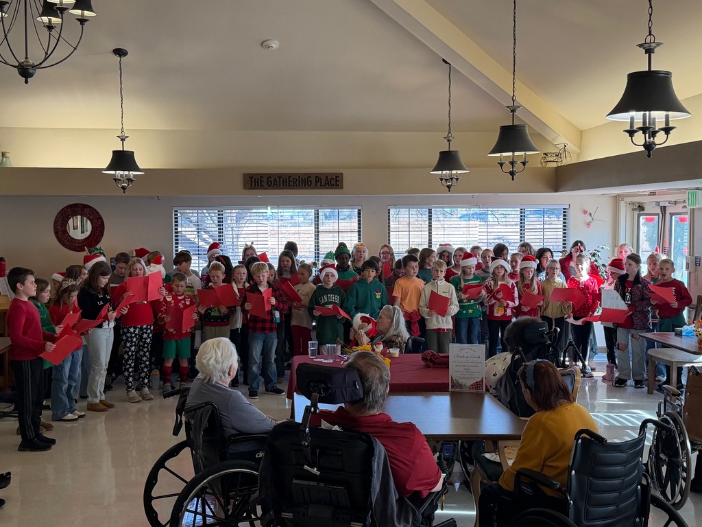 Students sing to a retirement community. 