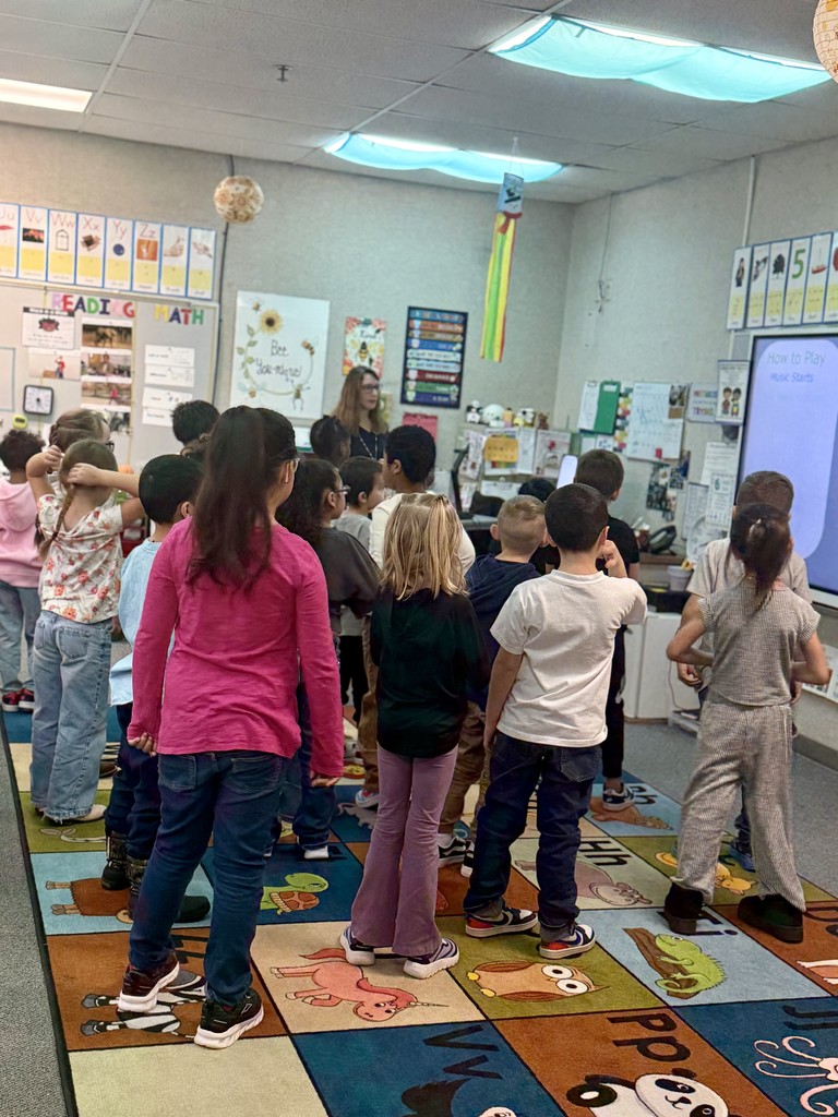Teacher and students in class