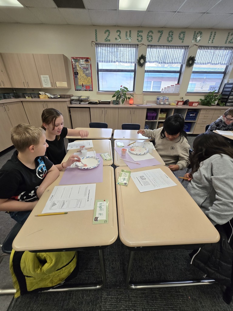 Students Working Hard and Smiling