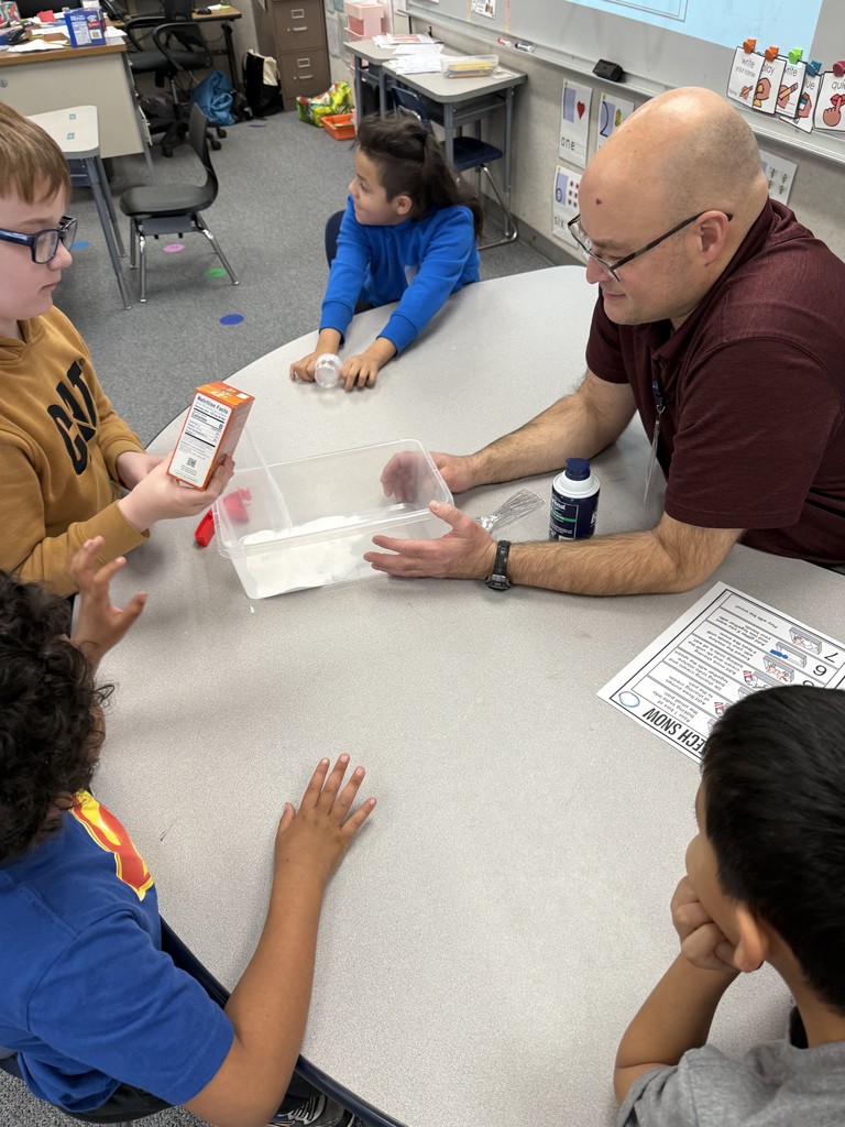 Melted Snowman with smiling student and staff