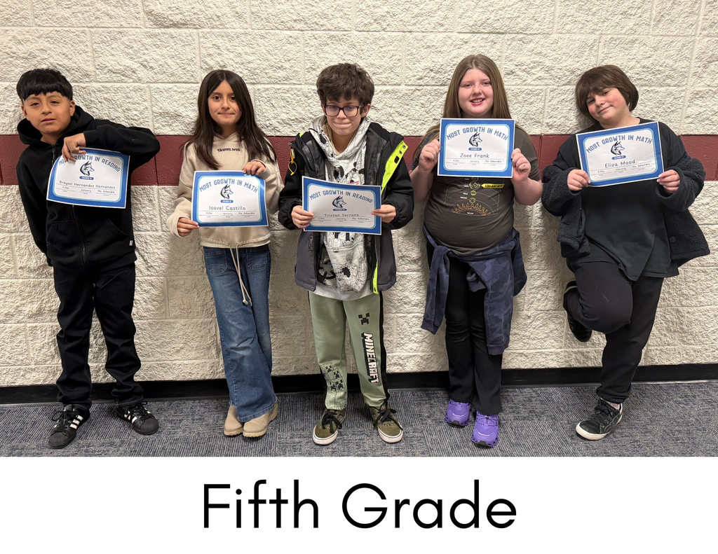 Students smiling with certificate