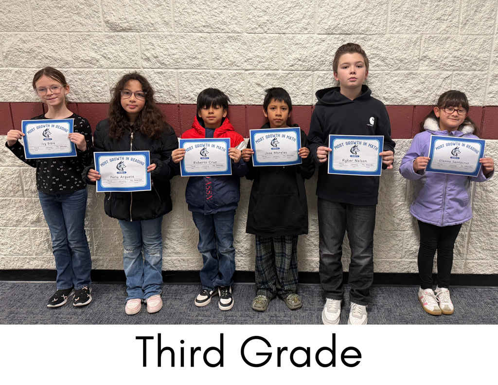 Students smiling with certificate