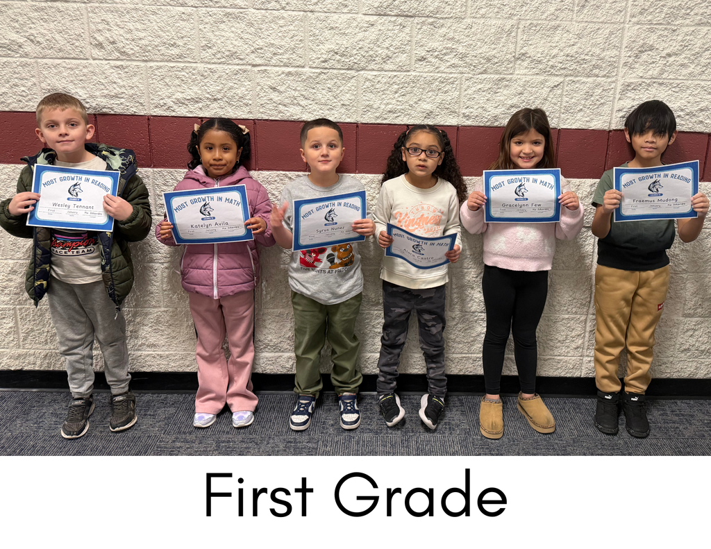 Students smiling with certificate