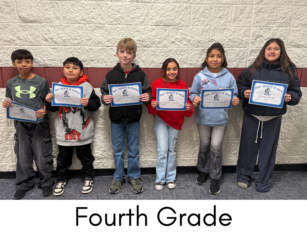 Students smiling with certificate