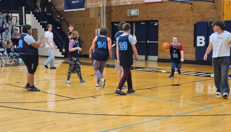 Students playing basketball