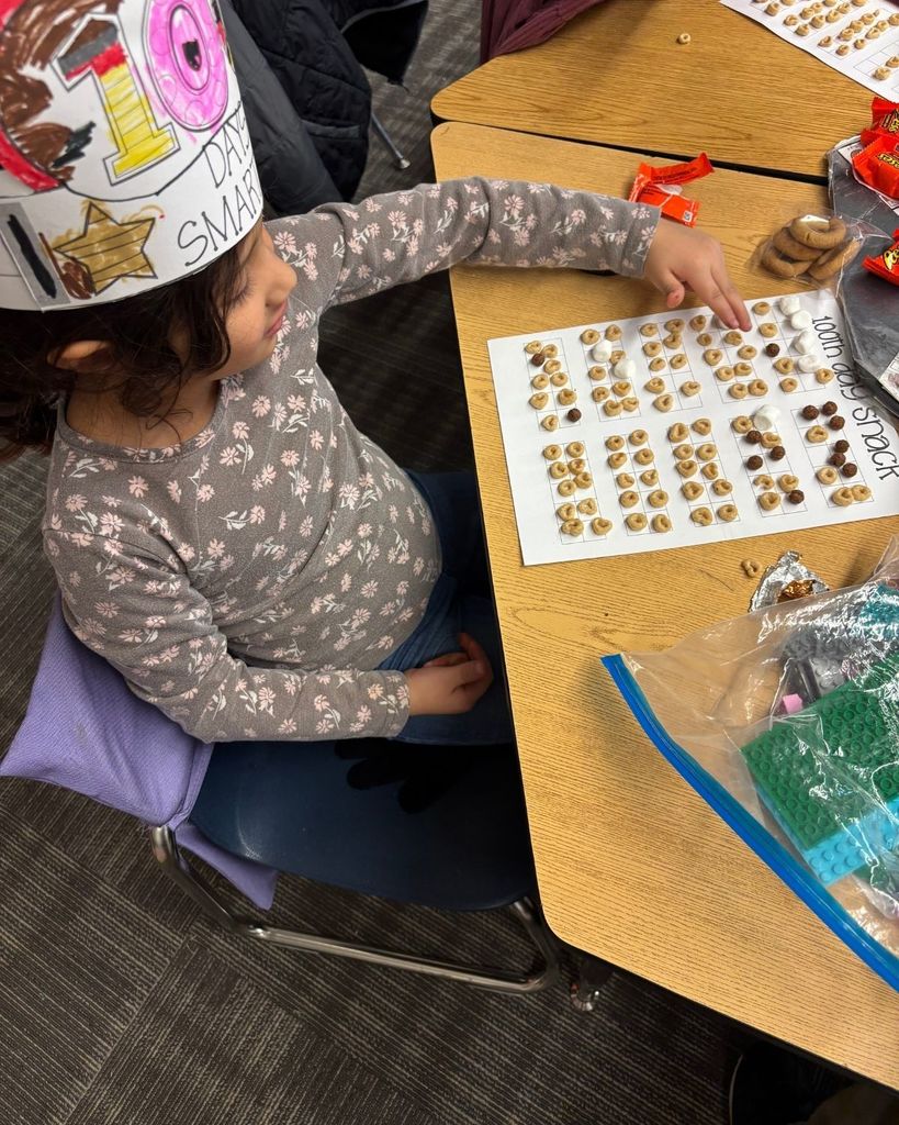 1 student counting 100 stanck items