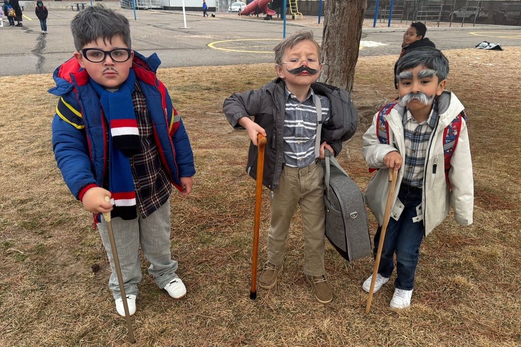 3 students dressed as old people
