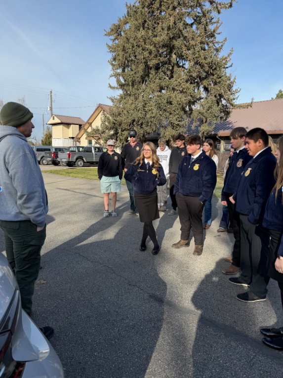 Group of students listening during a tour