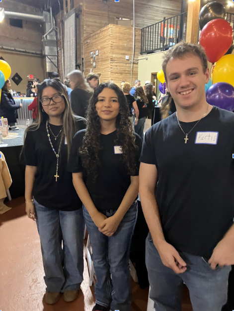 Three students posing for photo