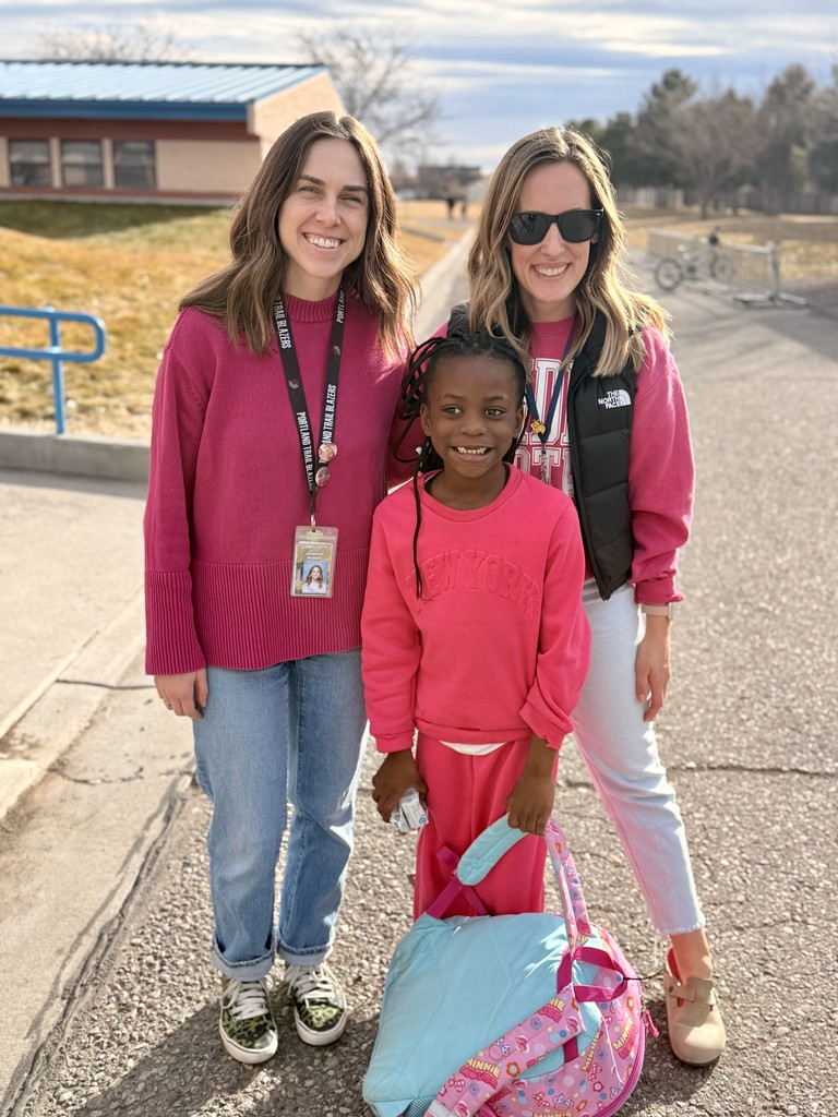 Student and teacher smiling