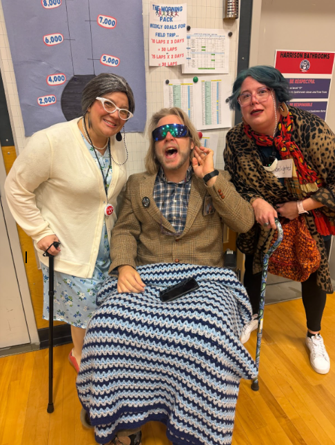 Three staff members dressed as senior citizens for the 100th day of school