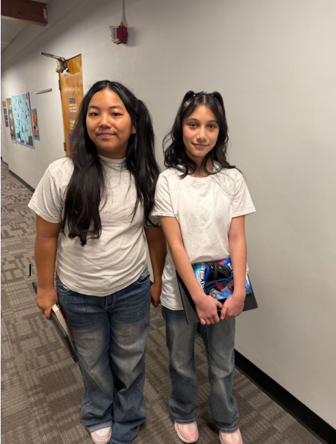 Two students dressed similarly for "Twin Day"