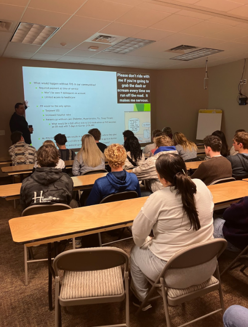 Students watching a presentation