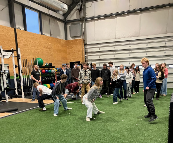 Students lined up, stretching