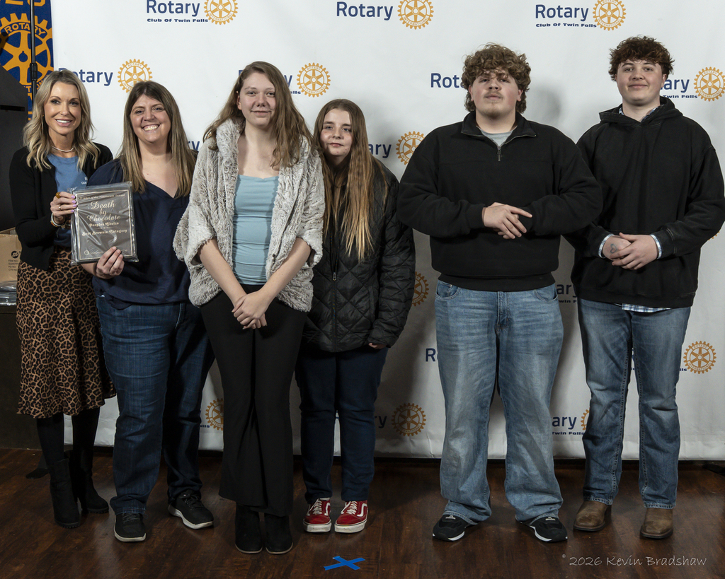 Students pictured with plaque