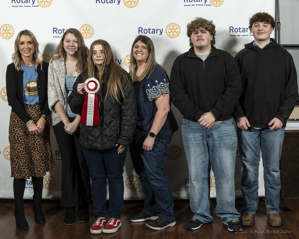Students pictured with ribbon